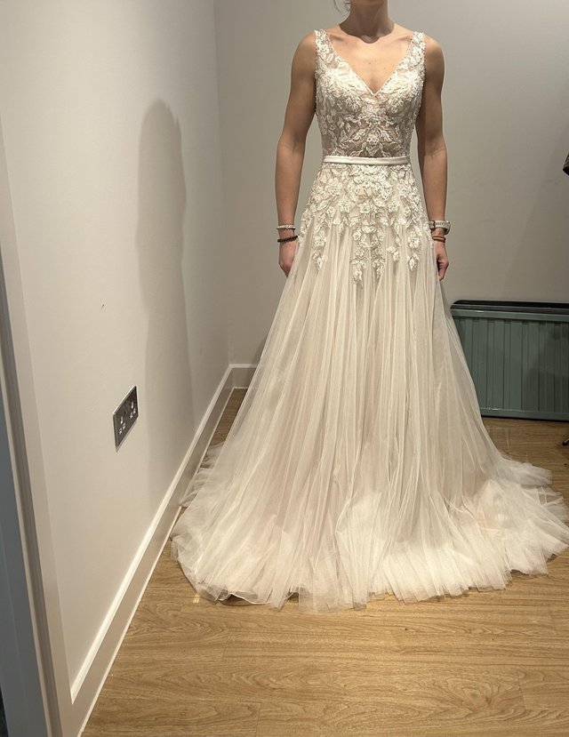 Preview of the first image of Designer Mark Lesley beaded wedding dress. worn 2 hours.