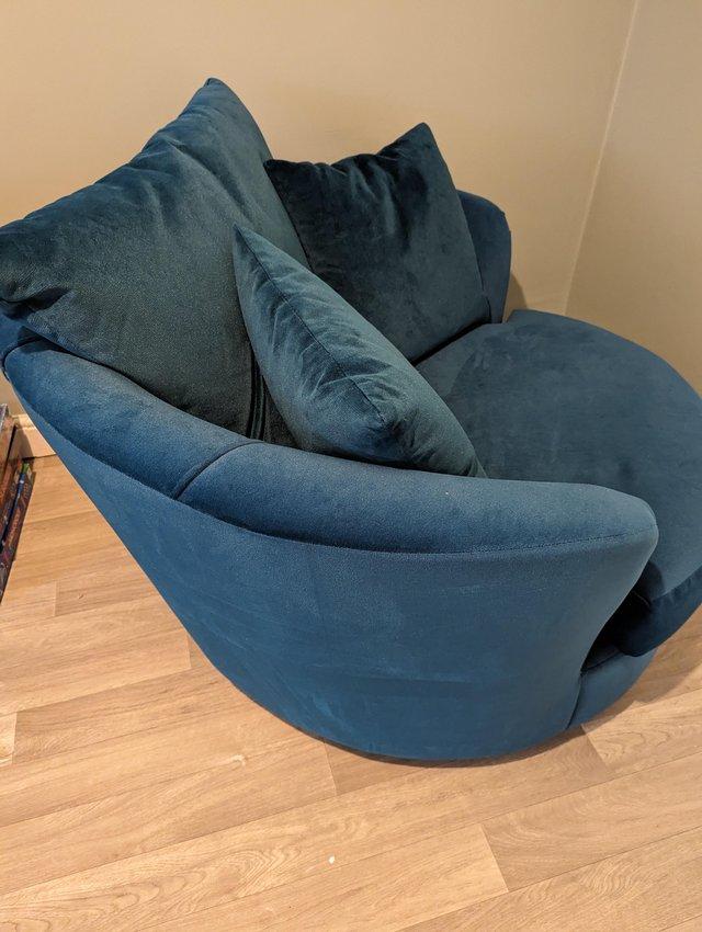 Preview of the first image of Sofology Teal Swivel chair.