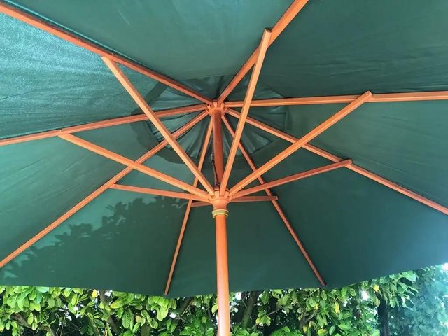 Preview of the first image of Large Hardwood Garden Parasol Unused.