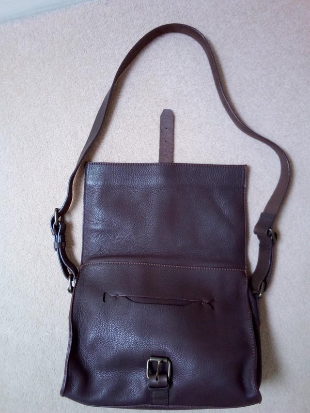 Preview of the first image of Brown Toast shoulder bag.