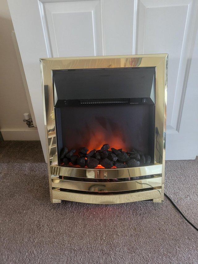 Preview of the first image of Electric fire with real like flame and coals.