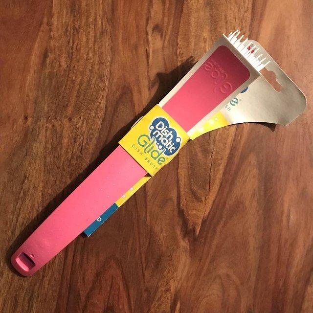 Preview of the first image of BNWT Dishmatic Glide dish brush, pink..