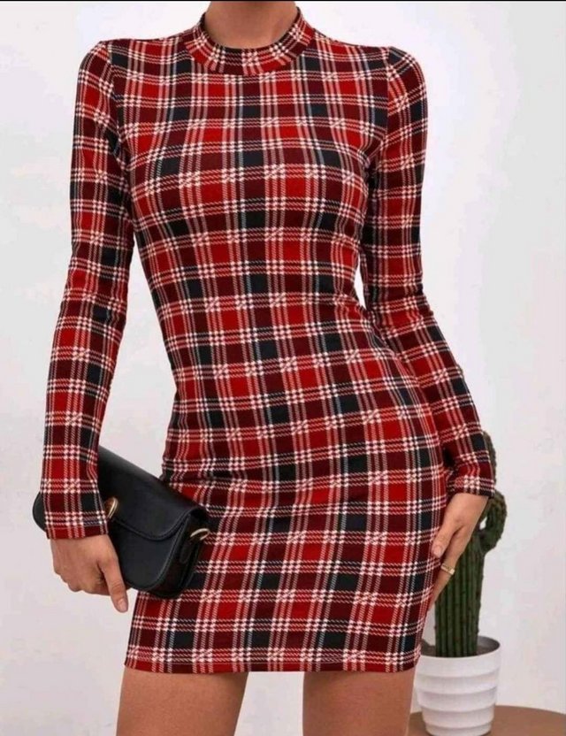 Preview of the first image of Size 8 lightweight plaid dress.