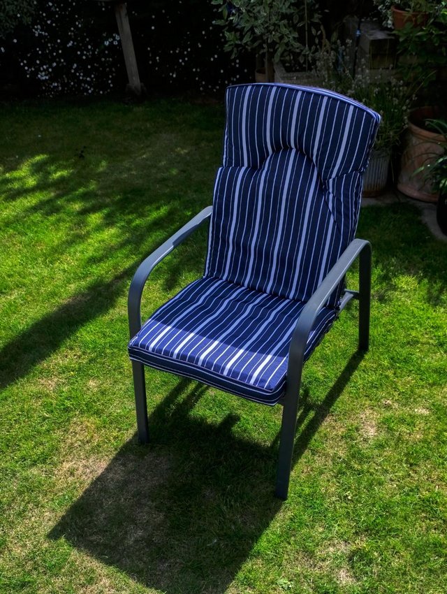 Preview of the first image of Two comfy upholstered garden chairs, new, can recline.