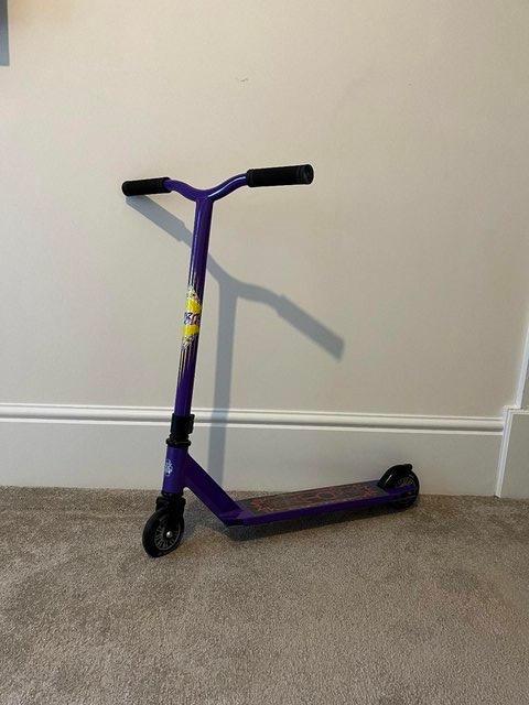 Preview of the first image of Grit Atom Purple Stunt Scooter.