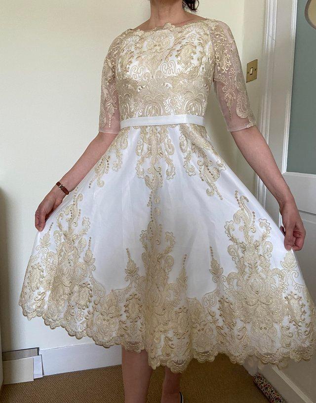 Preview of the first image of Wedding/special occasion dress size 14 -16, new, £60.