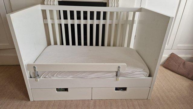Preview of the first image of IKEA Stuva baby cot + mattress.