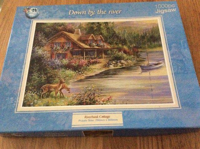 Preview of the first image of Like New - Cottage and Lake Jigsaw - Used Once Only.