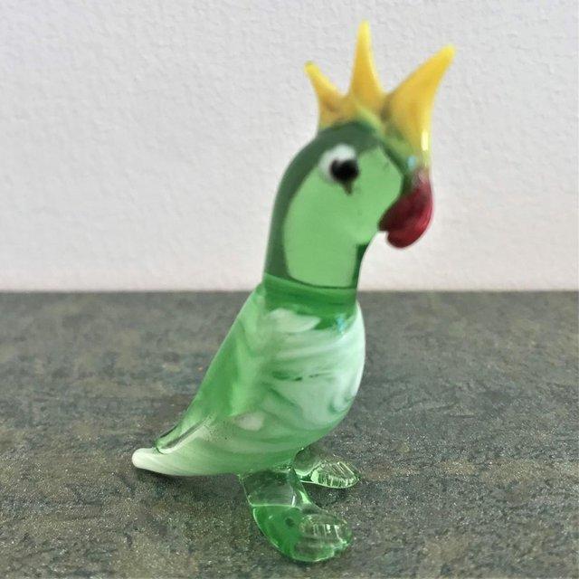 Preview of the first image of Vintage handmade glass parrot - tiny bit of damage..