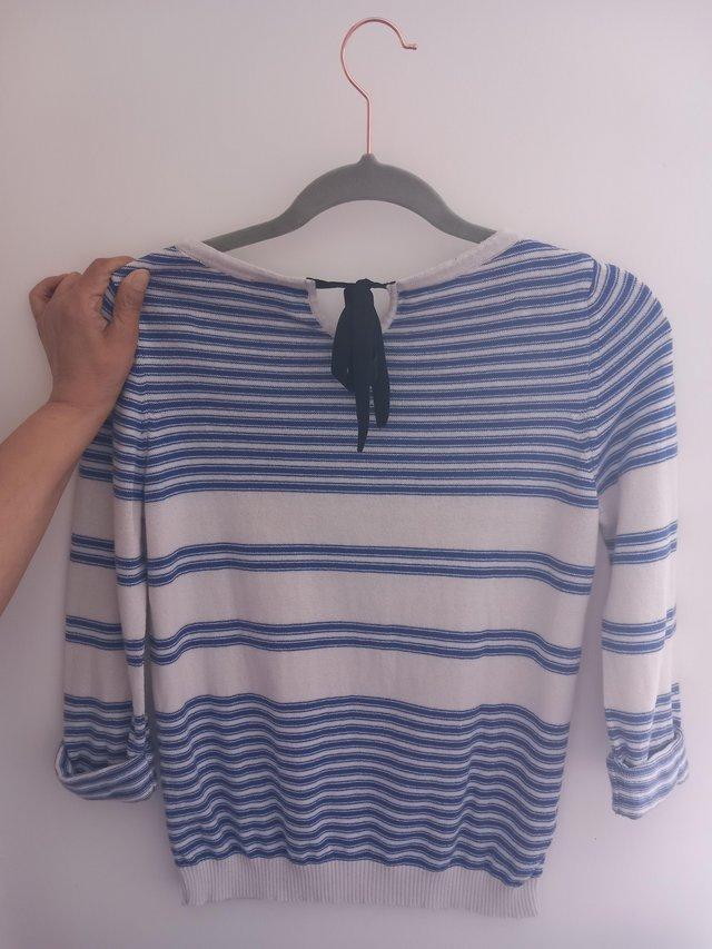 Preview of the first image of Topshop blue and white 3 quarter length jumper..