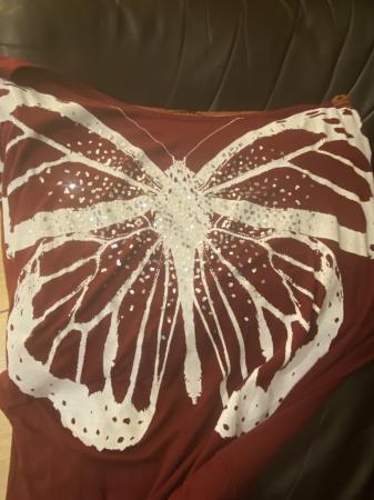 Image 3 of Top size 24. sequin's on a butterfly. By Proposal