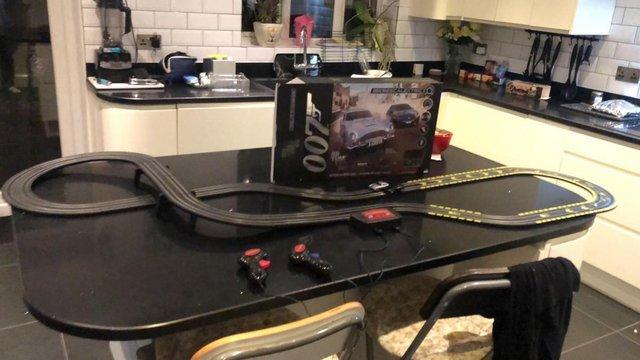 Preview of the first image of Micro Scalextric James Bond set with extension track.