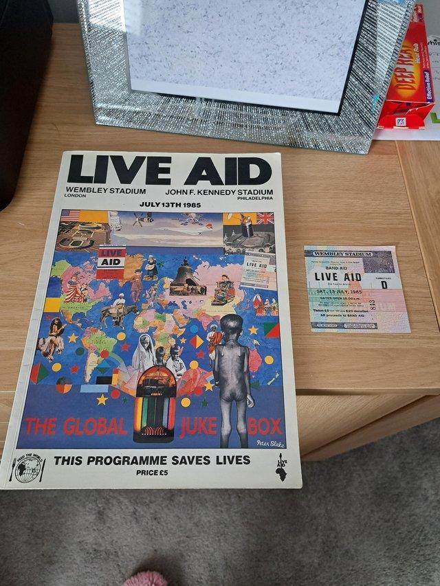 Preview of the first image of Genuine live aid programme and ticket stub..
