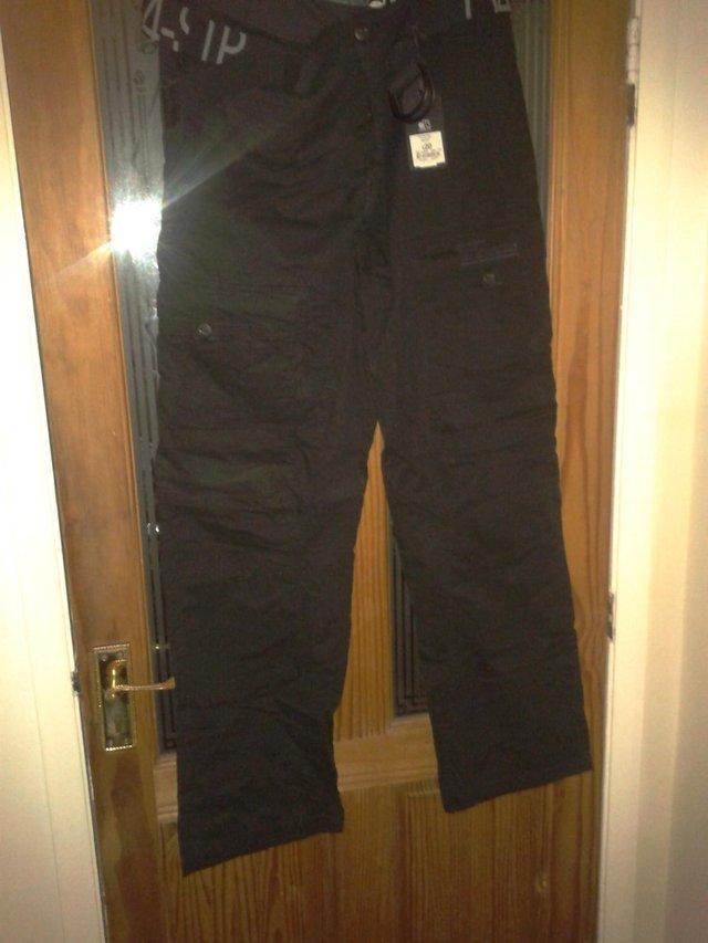 Preview of the first image of New Mens D73 cargo trousers 34W 32L.