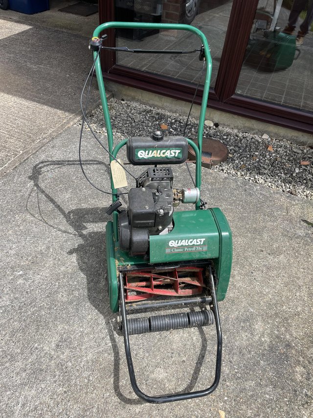 Preview of the first image of Qualcast 35s petrol lawn mower.