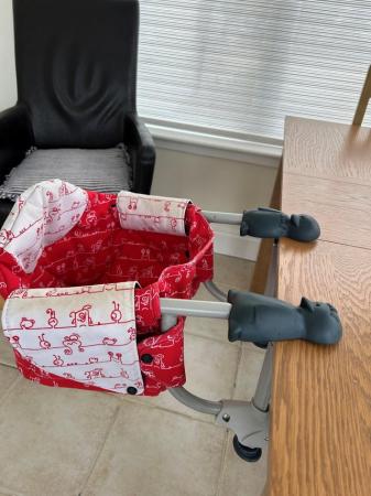 Image 1 of Chicco travel seat, high chair - used