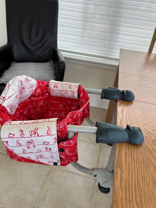 Preview of the first image of Chicco travel seat, high chair - used.
