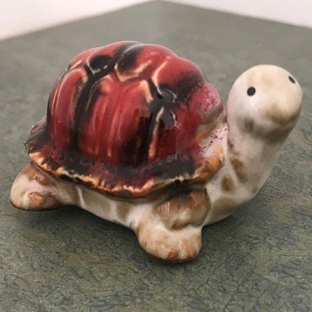 Preview of the first image of Ceramic tortoise ornament. Happy to post..