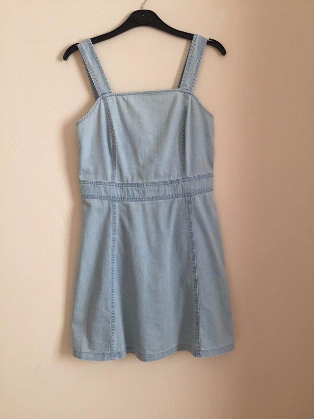 Preview of the first image of LADIES DENIM DRESS BRAND NEW…..