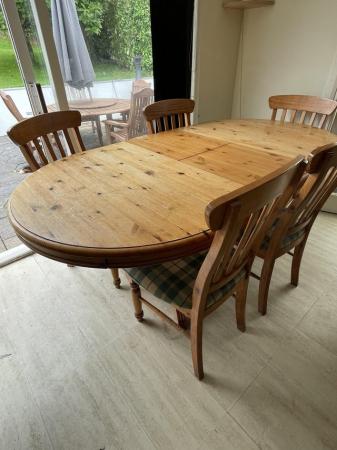 Image 1 of Large solid pine dining room table