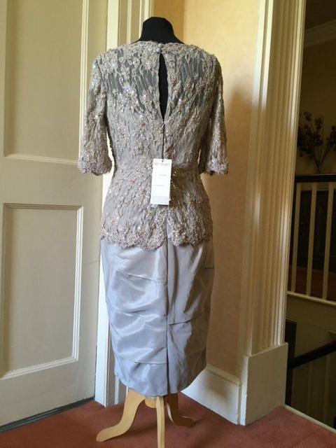 Preview of the first image of Ian Stuart Mother of the bride Dress in Warm Grey Size 12.