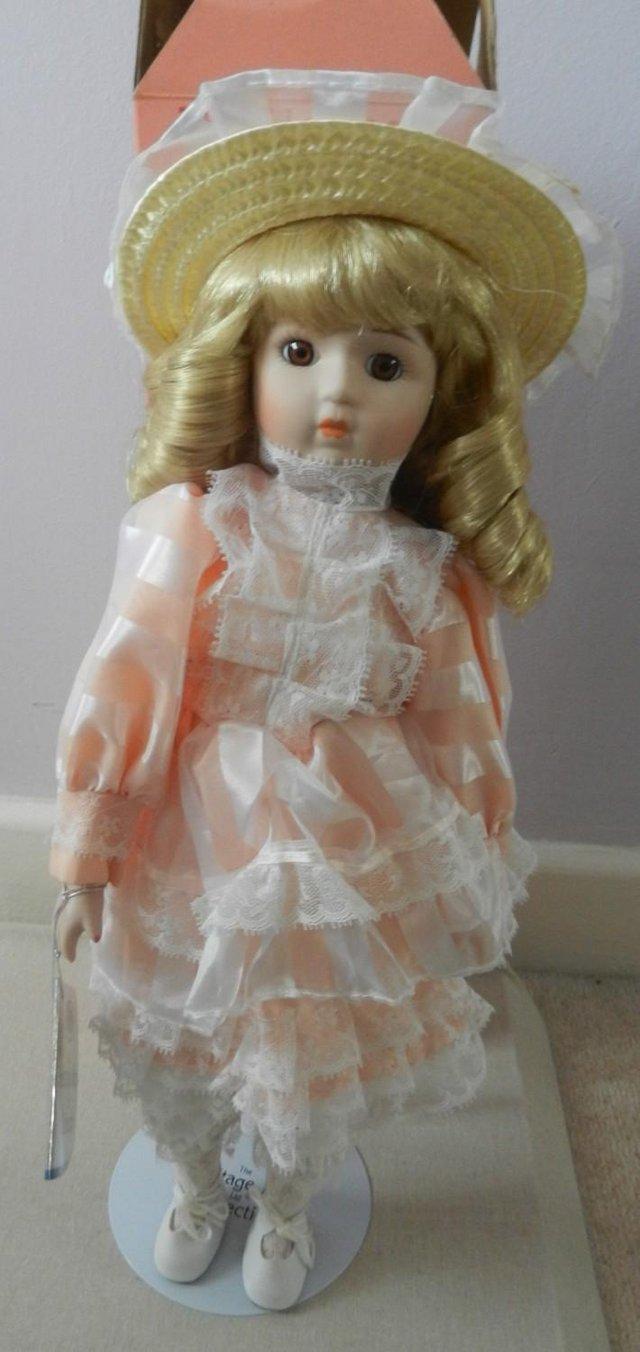 Preview of the first image of Vintage The Heritage Mint Collection Ashley Porcelain Doll.