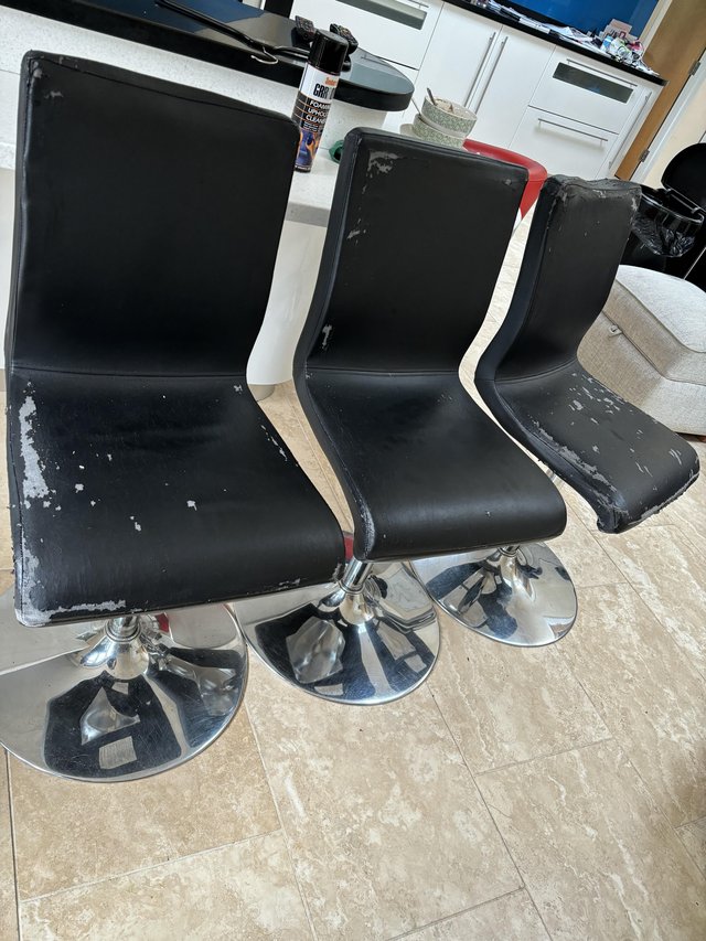 Preview of the first image of Black faux leather chairs for low breakfast bar.