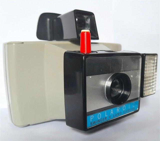 Preview of the first image of VINTAGE POLAROID SWINGER II INSTANT CAMERA.
