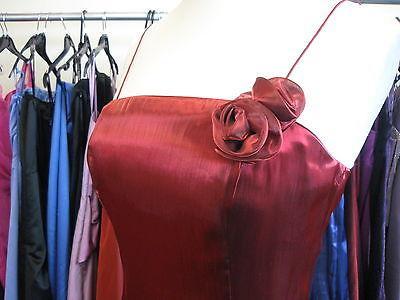 Preview of the first image of Claret red occasion dress and jacket size 18.