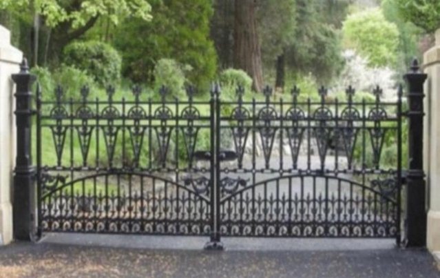 Image 2 of Cast iron gates with posts