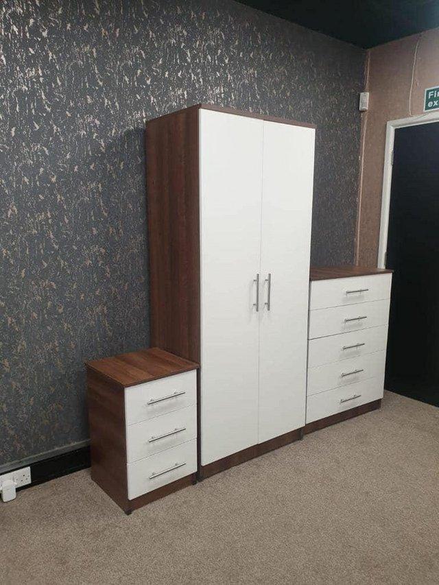 Preview of the first image of NOVA WALNUT AND WHITE WARDROBE CHEST AND BEDSIDE.