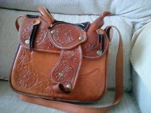 Preview of the first image of Ladies western leather saddle bag.