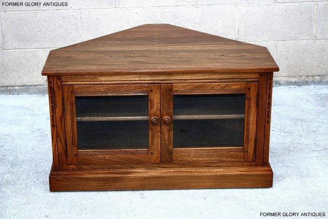 Image 1 of AN ERCOL GOLDEN DAWN ELM CORNER TV CABINET STAND TABLE UNIT