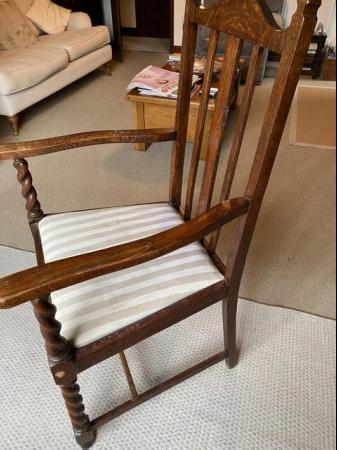 Image 1 of Upright chair with arms and high back