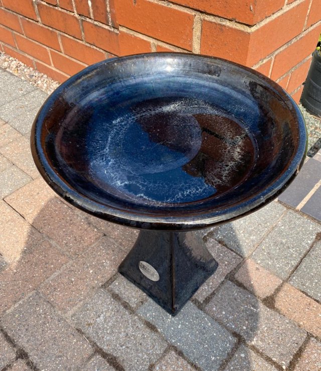 Preview of the first image of Black ceramic glazed Bird Bath..