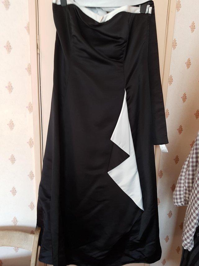 Preview of the first image of Black long dress for special occasion.