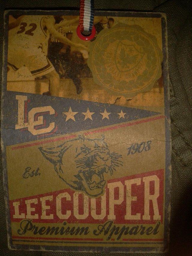 Preview of the first image of New Mens Lee Cooper cargo trousers 34W 32L.