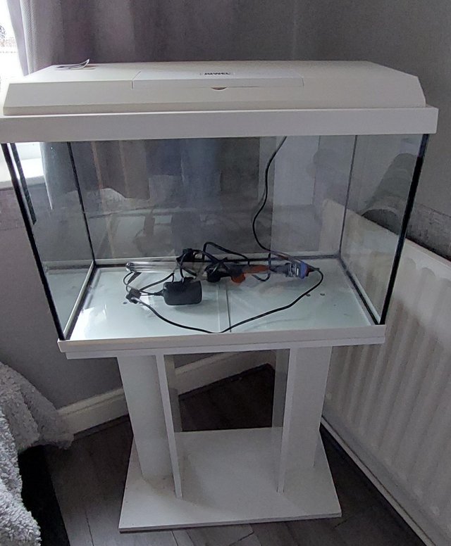 Preview of the first image of 65 Lt white aquarium withstand.