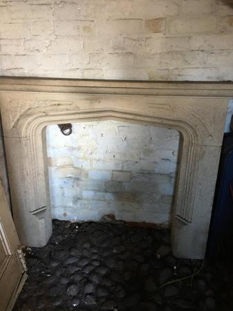 Image 1 of Fireplace mantle surround. Looks in okay condition.