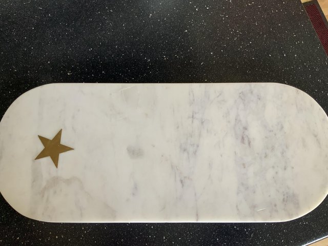 Preview of the first image of Cheeseboard marble with beautiful gold star.