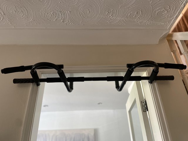 Preview of the first image of Home gym pull up bar for door frame.