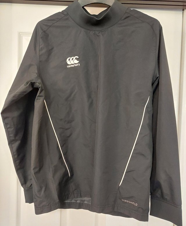 Preview of the first image of Canterbury rugby waterproof top size small.
