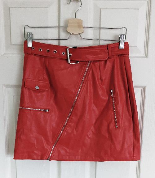 Preview of the first image of Lovely Ladies Red Faux Leather Mini Skirt - Size 10.