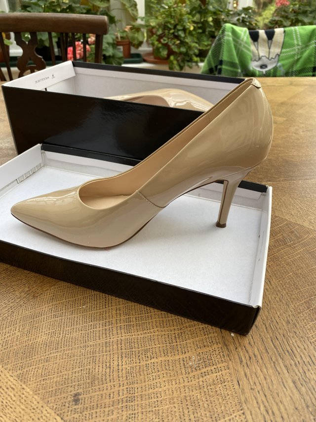 Preview of the first image of Nude coloured Nine West shoes size 6.