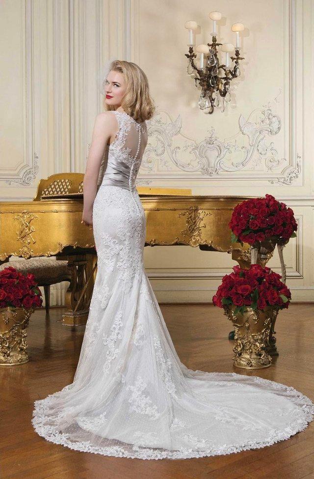 Preview of the first image of Beautiful Size 10 Justin Alexander Lace Dress Style 8596.
