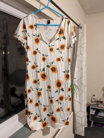 Image 1 of Woman's mini dress with sunflowers