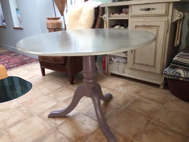 Preview of the first image of circular tripod table with a tilt top.