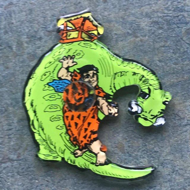 Preview of the first image of Vintage Fred Flintstone/dinosaur plastic fridge magnet..