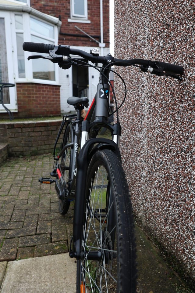 Preview of the first image of HYBRID BIKE RIVERSIDE 500 with mudguards and rack.