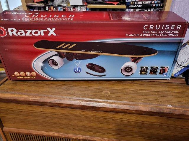 Preview of the first image of Brand ne Razor X Electric skateboard never used and boxed.